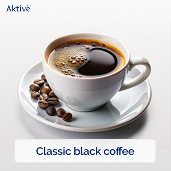 black coffee in a white cup and in a white saucer